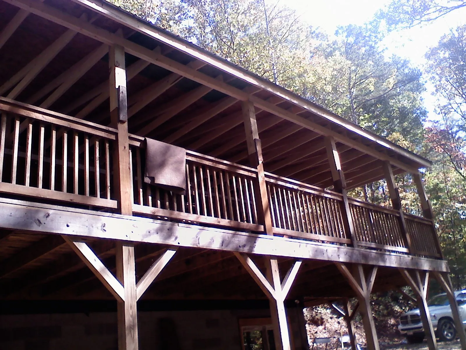 Timber framing under a new elevated porch and deck — Roof Leak Repair in Day by Roofing Brothers